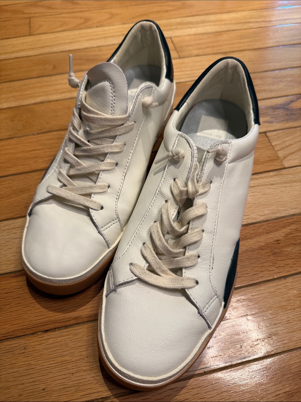Zina Sneaker by Dolce Vita White and Black Leather